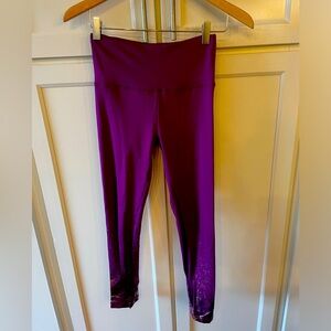 Purple and gold workout leggings